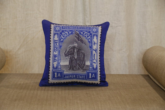 Royal blue silk cushion cover printed with a Jaipur State elephant postage stamp, front view