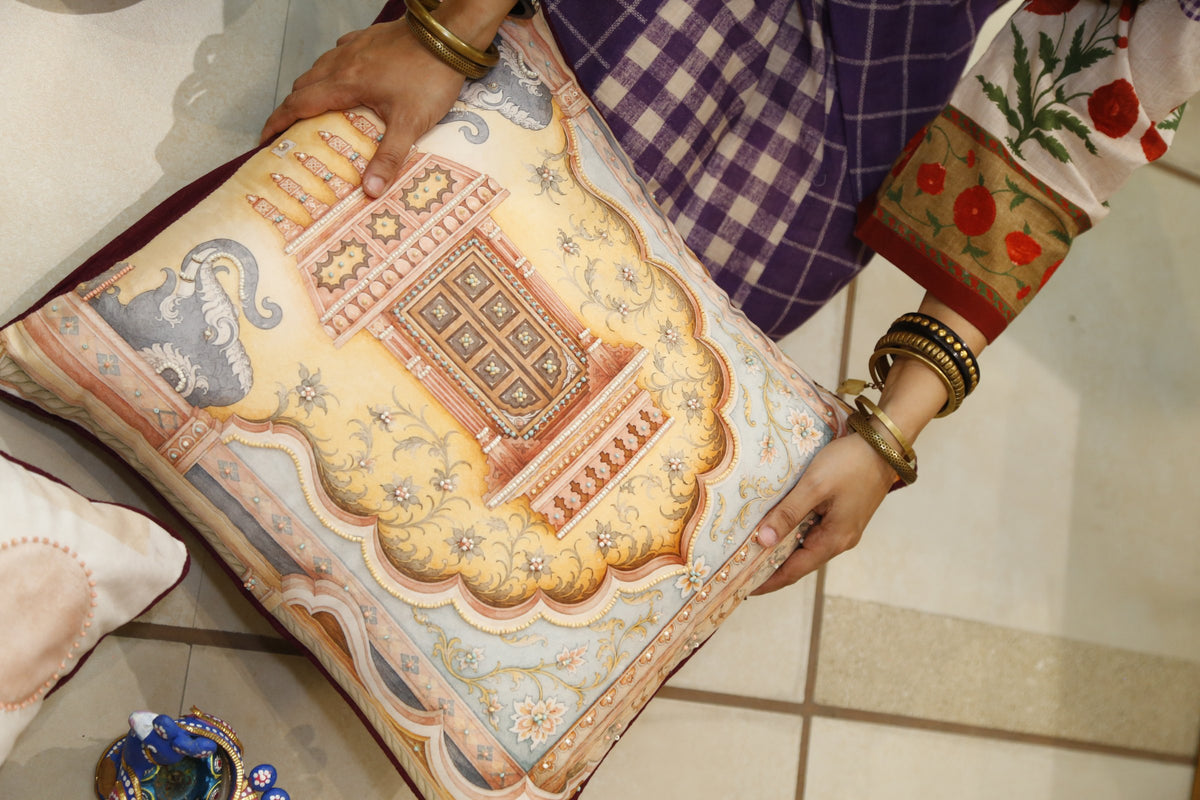 Golden blue jharokha cushion cover showing the arch motif and bead detail