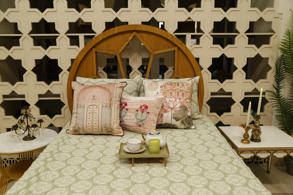 Sage block print bedding set, wider room view with a styled tea tray