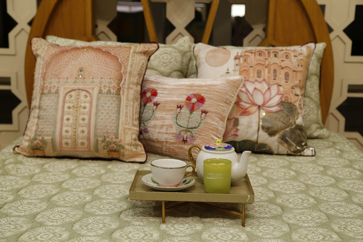 Close view of the sage green block print bedcover fabric