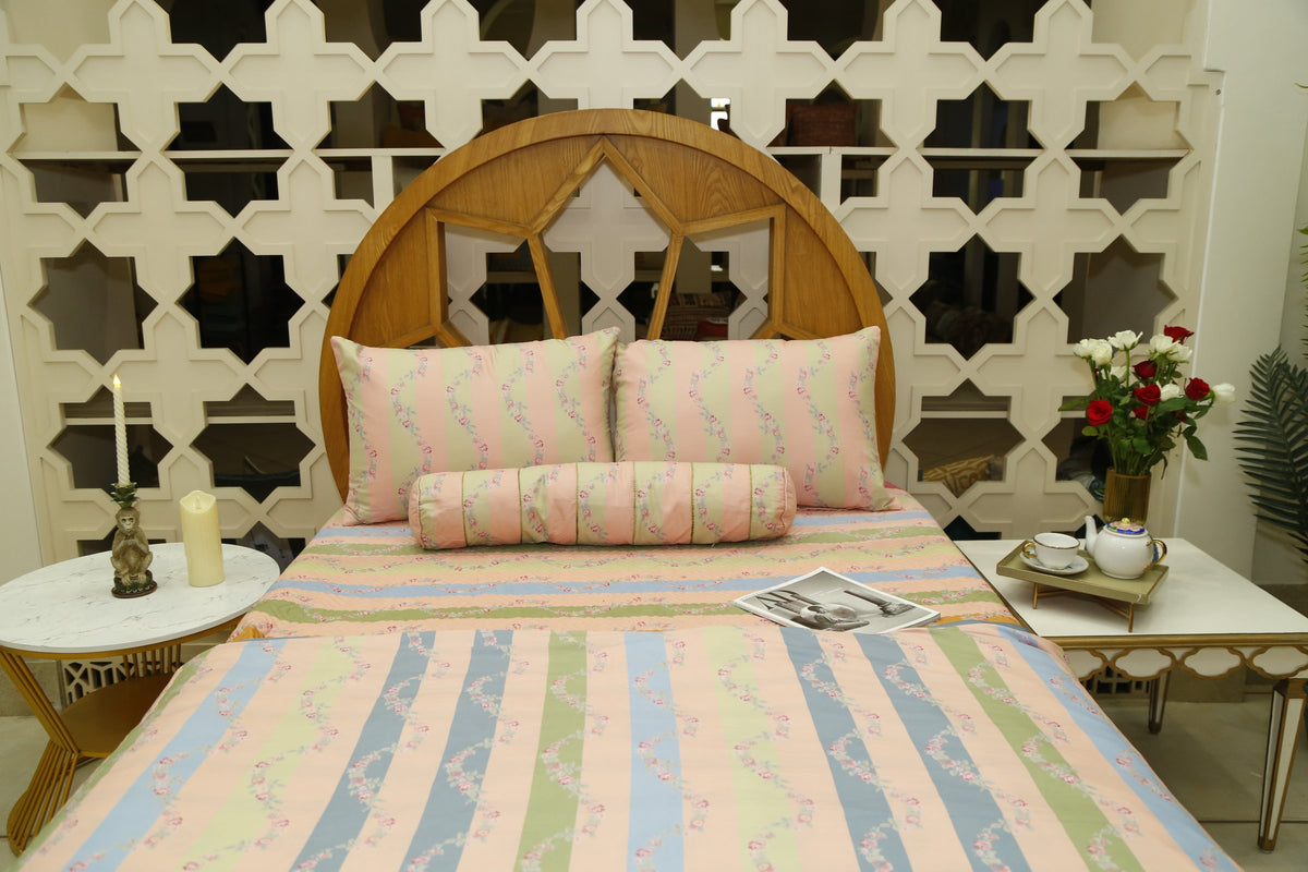 Close view of the pastel stripe floral garland print