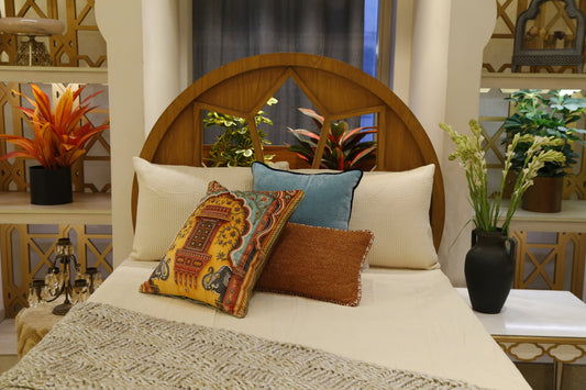 Ivory bedcover set with hand-crocheted throw and royal jharokha cushion cover