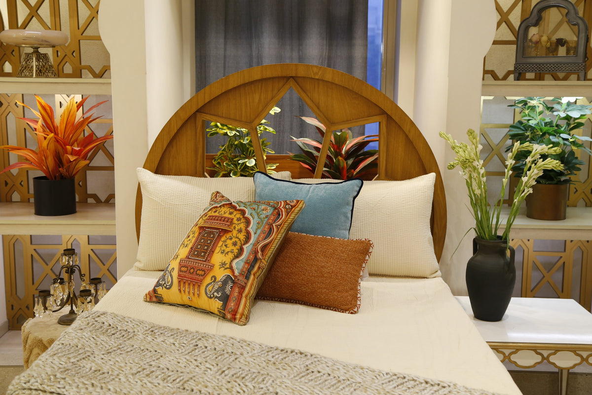 Ivory heritage bedding set, wider room view with the crochet throw draped