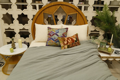 Sage crinkle quilt set, wider room view