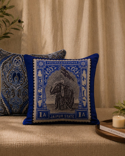 Jaipur elephant stamp cushion layered on a linen bench seat