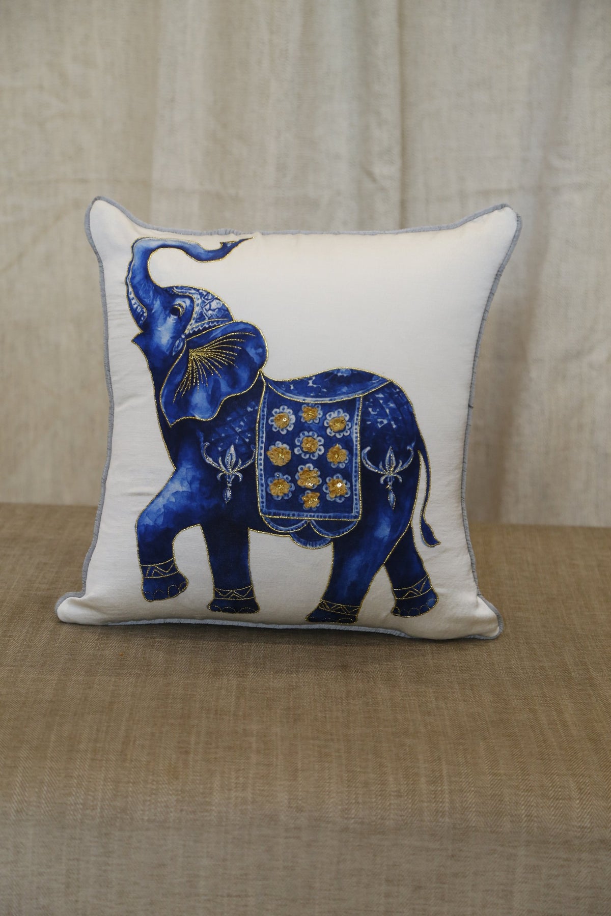 Into the Blue elephant cushion cover showing the gold caparison detail
