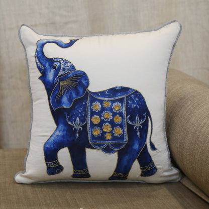 Ivory silk cushion cover printed with a cobalt and gold ceremonial elephant, 18x18 inches