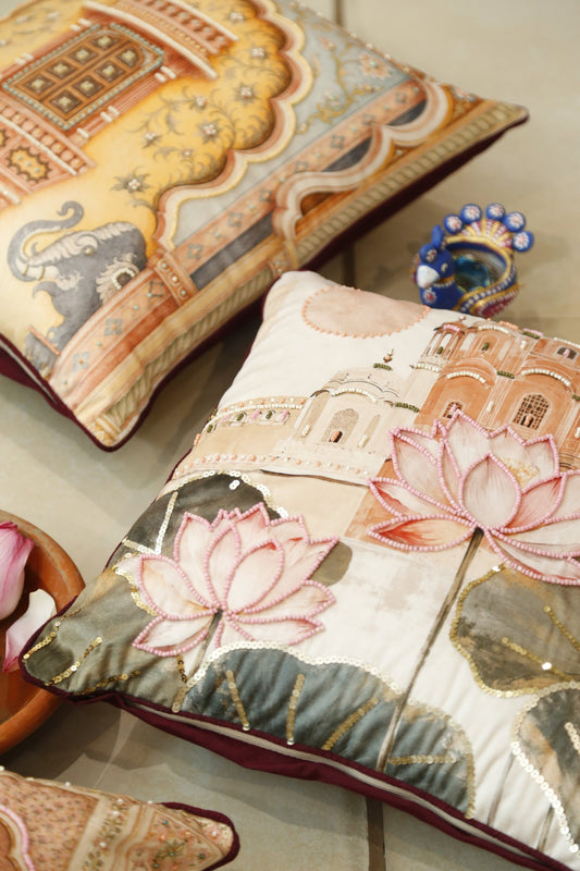 Lotus Palace beaded velvet cushion cover styled on a sage bedcover