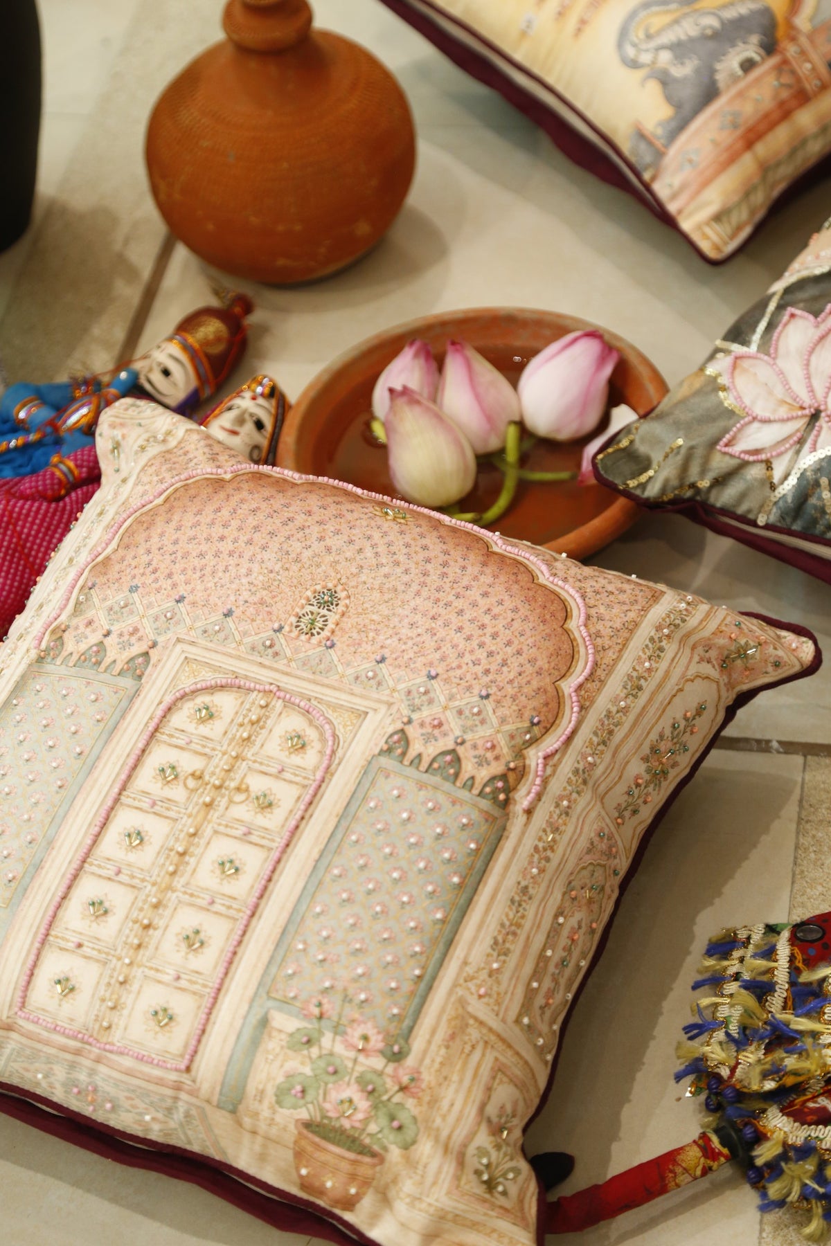 Lotus Palace cushion cover showing the hand bead embroidery and lotus motif
