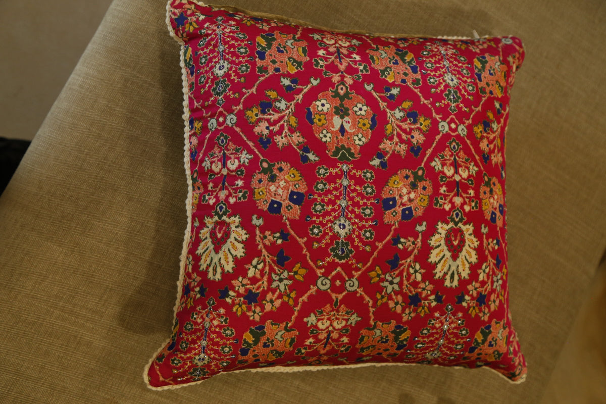 Ruby red floral millefleur printed silk cushion cover, front view