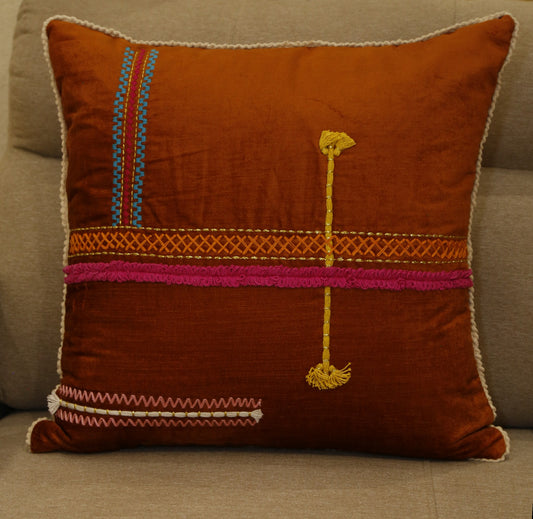 Rust cushion cover with magenta band and traditional hand embroidery, 18x18 inches